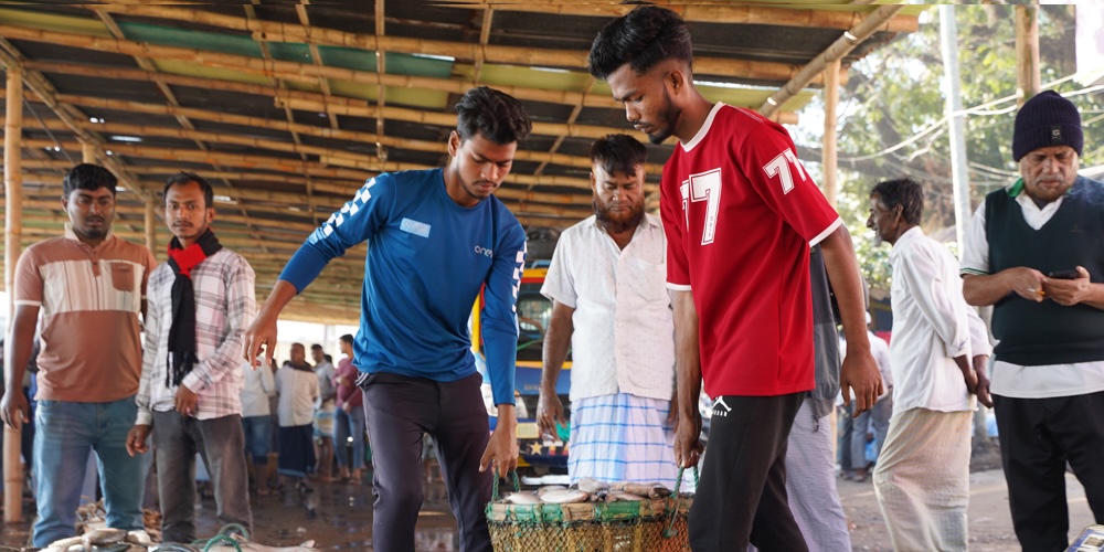 Morning trade at a fish market in Bangladesh.